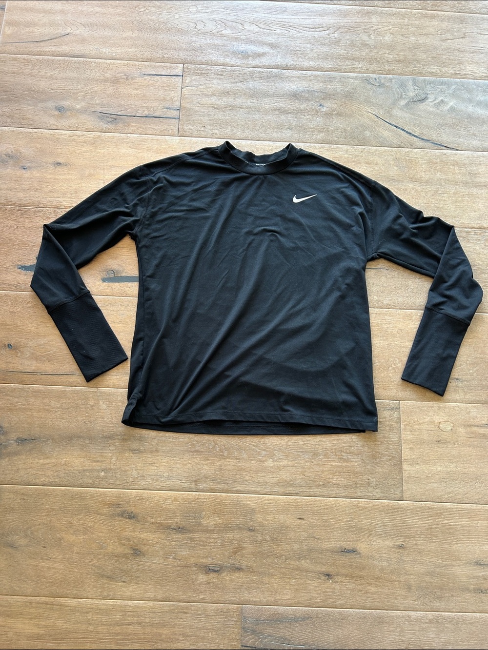 Nike Black Long Sleeve Performance Top with White Swoosh